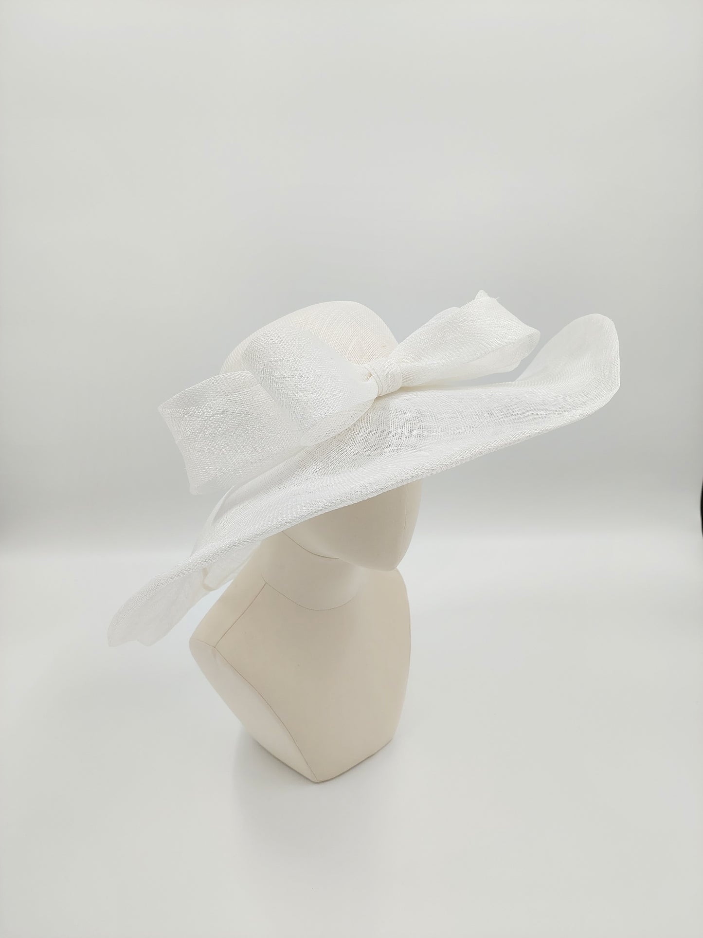 Hat Haven Millinery hat store in Louisville Kentucky, custom hat maker, miller, ladies dress hats, wedding hats, Kentucky Derby hats, fascinators, hatinators, men's hats, hat bands, Ascot hats, fashion on the field, race day hats.