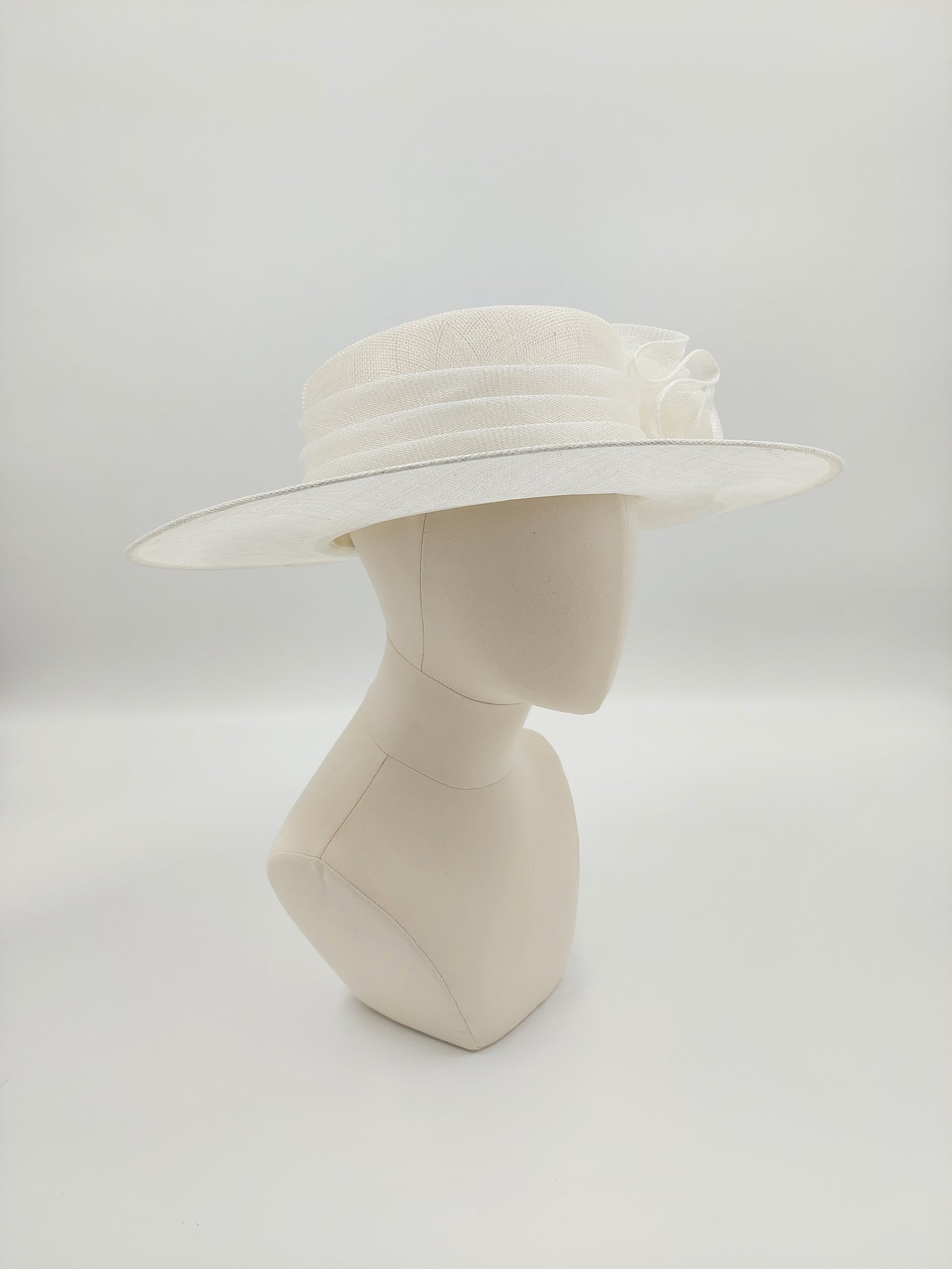 Hat Haven Millinery hat store in Louisville Kentucky, custom hat maker, miller, ladies dress hats, wedding hats, Kentucky Derby hats, fascinators, hatinators, men's hats, hat bands, Ascot hats, fashion on the field, race day hats.