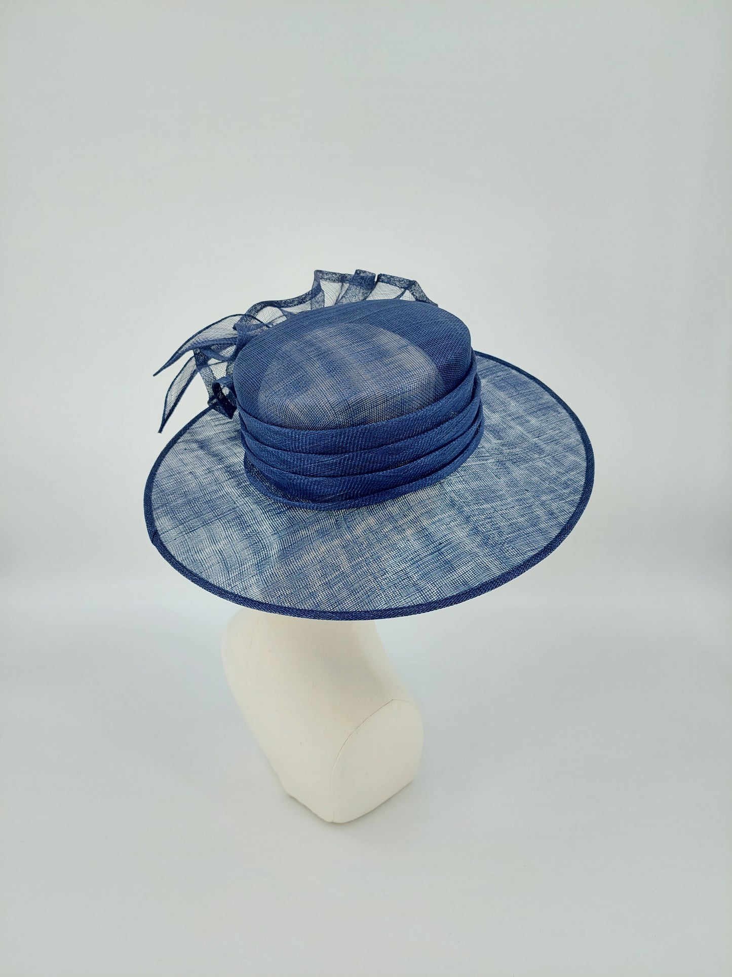 Hat Haven Millinery hat store in Louisville Kentucky, custom hat maker, miller, ladies dress hats, wedding hats, Kentucky Derby hats, fascinators, hatinators, men's hats, hat bands, Ascot hats, fashion on the field, race day hats.