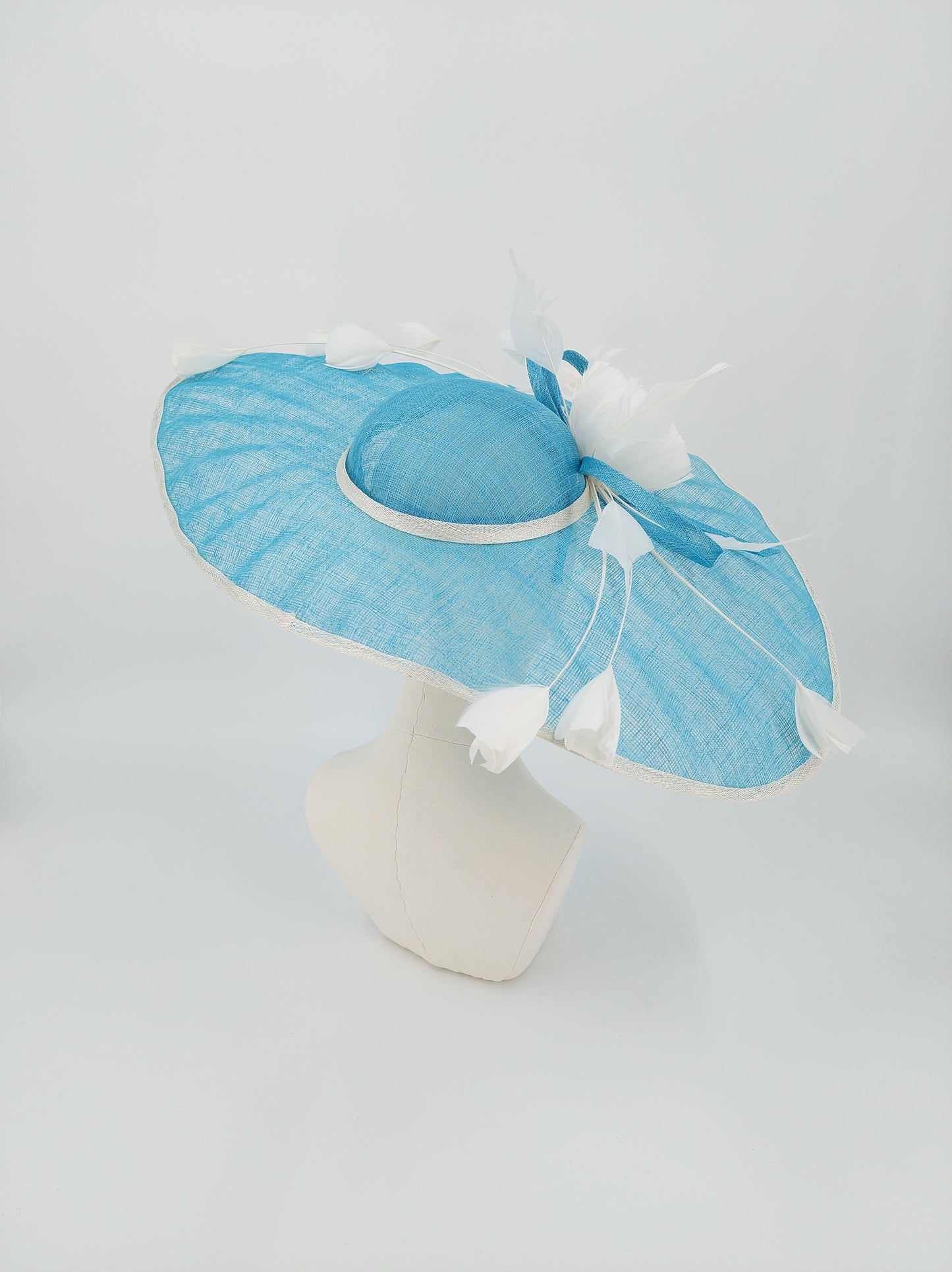 Hat Haven Millinery hat store in Louisville Kentucky, custom hat maker, miller, ladies dress hats, wedding hats, Kentucky Derby hats, fascinators, hatinators, men's hats, hat bands, Ascot hats, fashion on the field, race day hats.