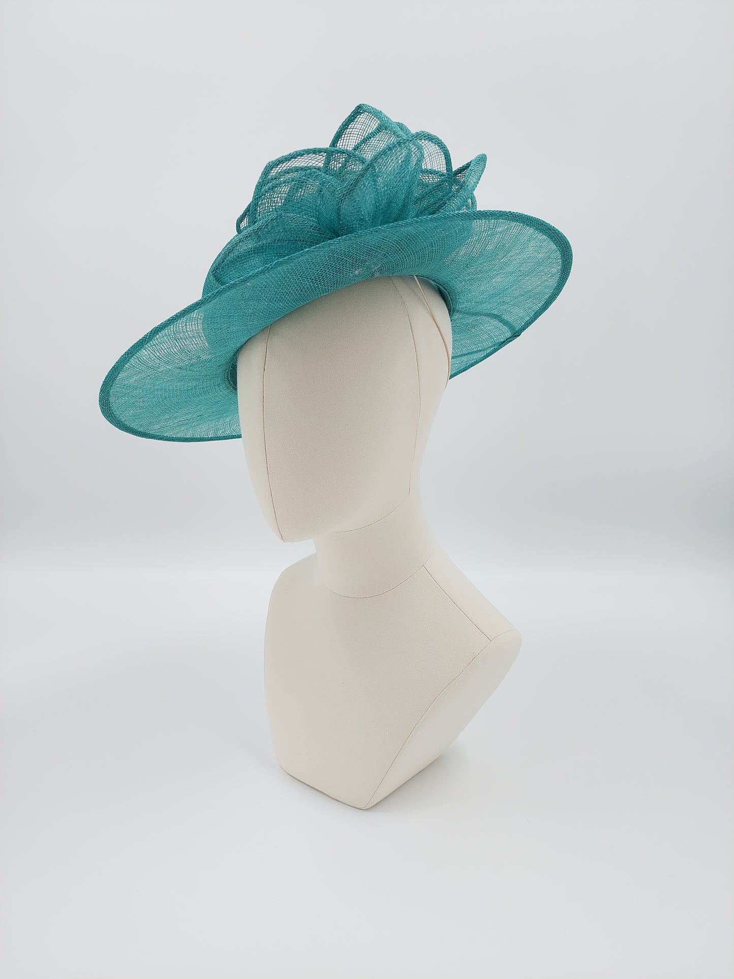Hat Haven Millinery hat store in Louisville Kentucky, custom hat maker, miller, ladies dress hats, wedding hats, Kentucky Derby hats, fascinators, hatinators, men's hats, hat bands, Ascot hats, fashion on the field, race day hats.