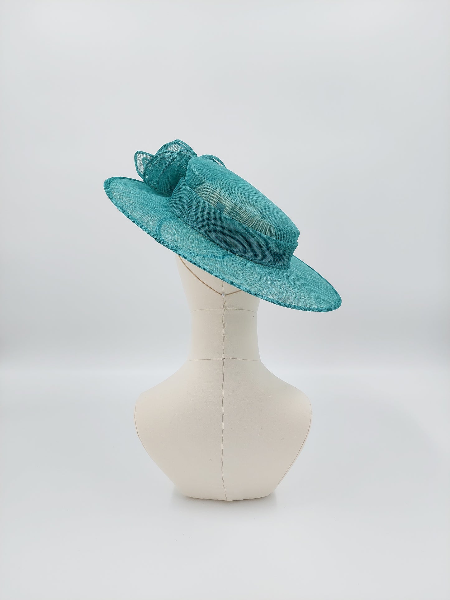 Hat Haven Millinery hat store in Louisville Kentucky, custom hat maker, miller, ladies dress hats, wedding hats, Kentucky Derby hats, fascinators, hatinators, men's hats, hat bands, Ascot hats, fashion on the field, race day hats.