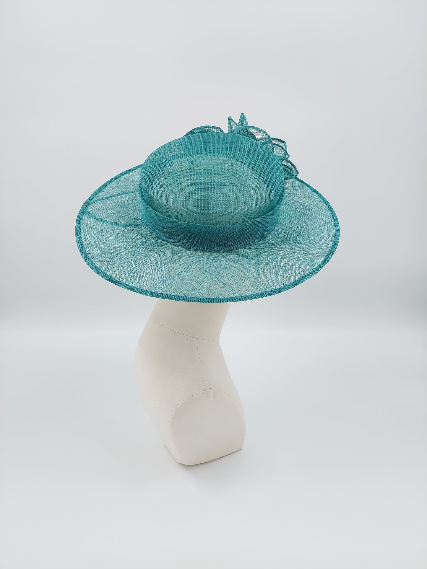 Hat Haven Millinery hat store in Louisville Kentucky, custom hat maker, miller, ladies dress hats, wedding hats, Kentucky Derby hats, fascinators, hatinators, men's hats, hat bands, Ascot hats, fashion on the field, race day hats.