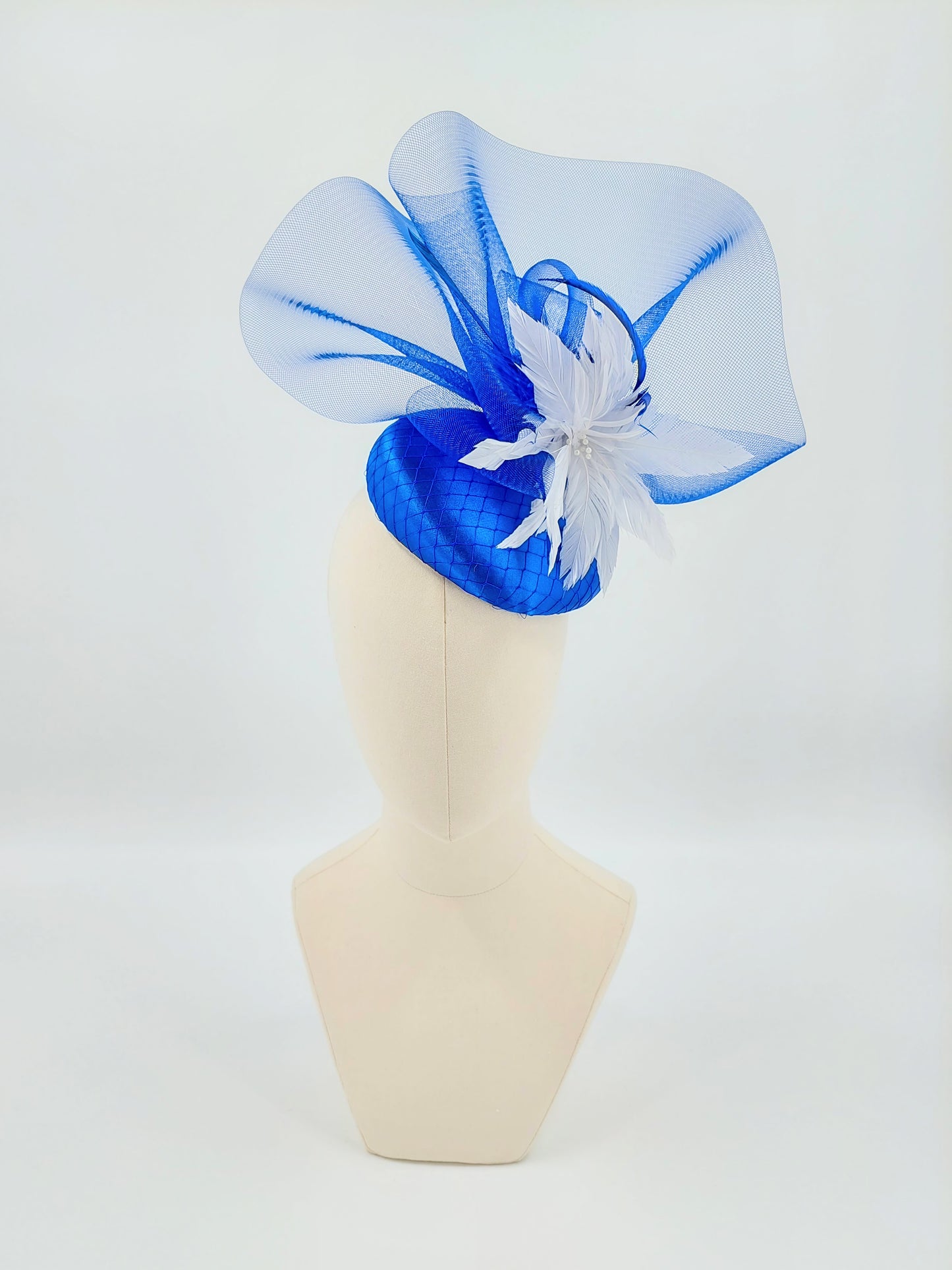 Hat Haven Millinery hat store in Louisville Kentucky, custom hat maker, miller, ladies dress hats, wedding hats, Kentucky Derby hats, fascinators, hatinators, men's hats, hat bands, Ascot hats, fashion on the field, race day hats.