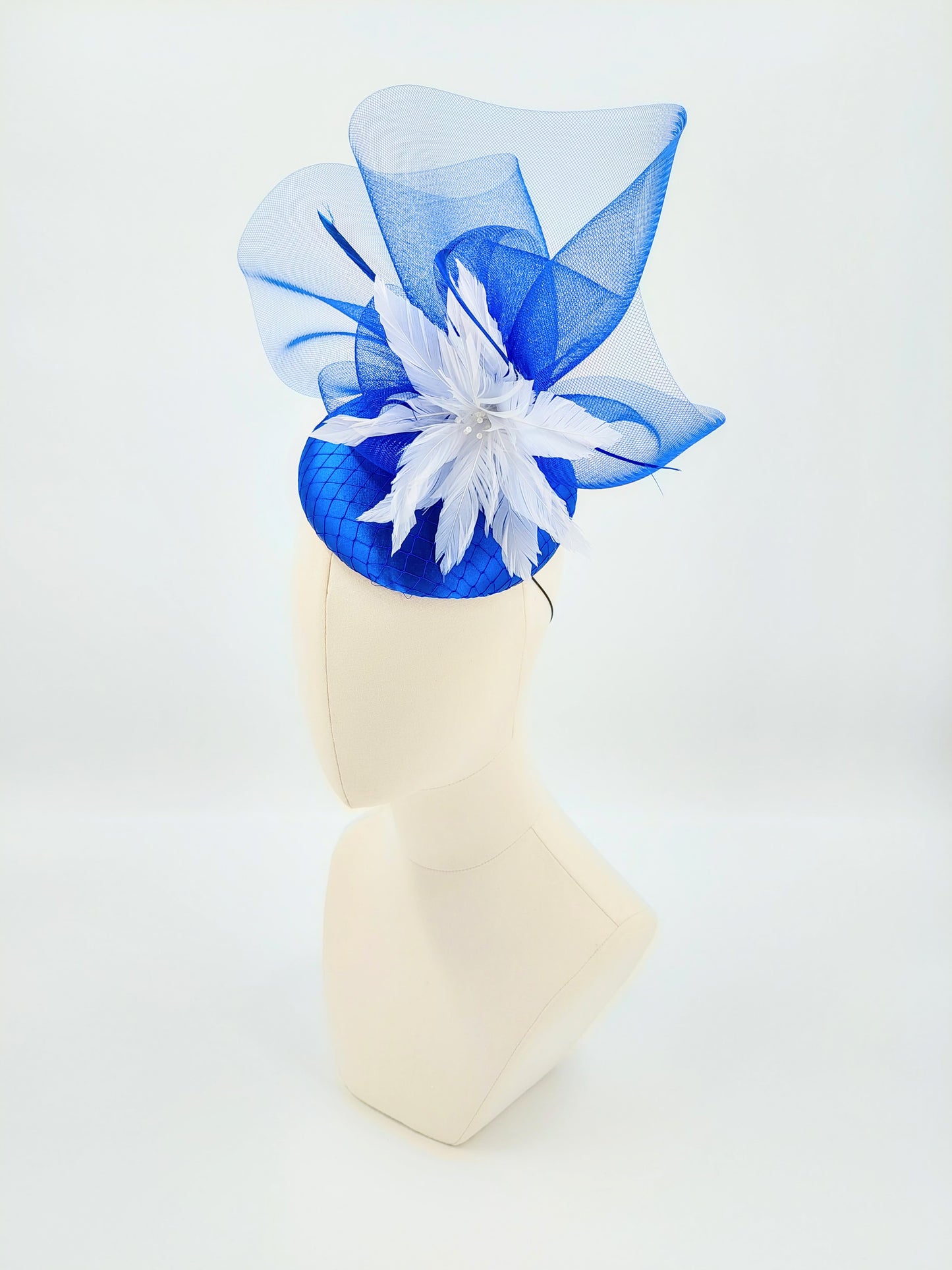 Hat Haven Millinery hat store in Louisville Kentucky, custom hat maker, miller, ladies dress hats, wedding hats, Kentucky Derby hats, fascinators, hatinators, men's hats, hat bands, Ascot hats, fashion on the field, race day hats.