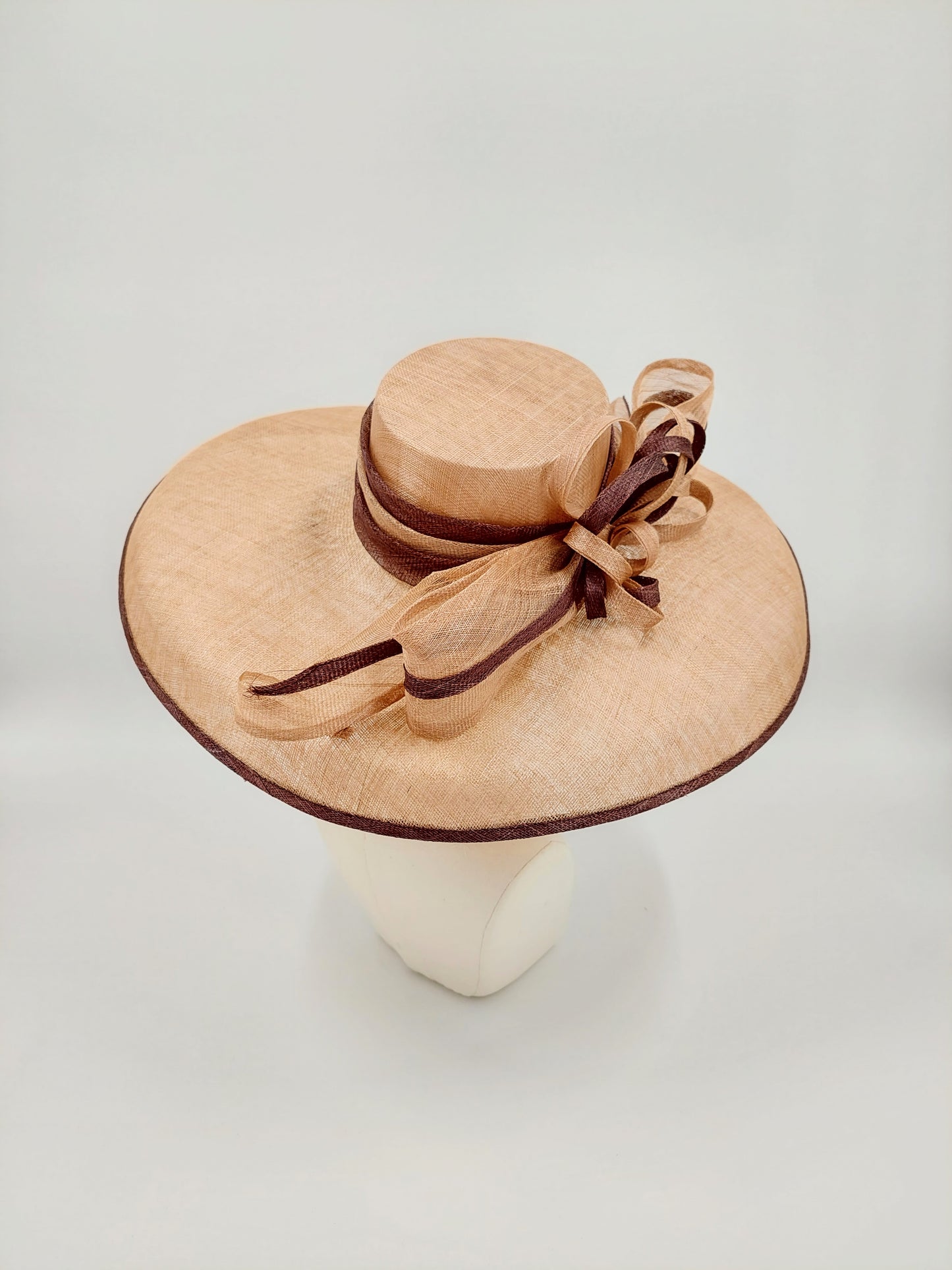 Hat Haven Millinery hat store in Louisville Kentucky, custom hat maker, miller, ladies dress hats, wedding hats, Kentucky Derby hats, fascinators, hatinators, men's hats, hat bands, Ascot hats, fashion on the field, race day hats.