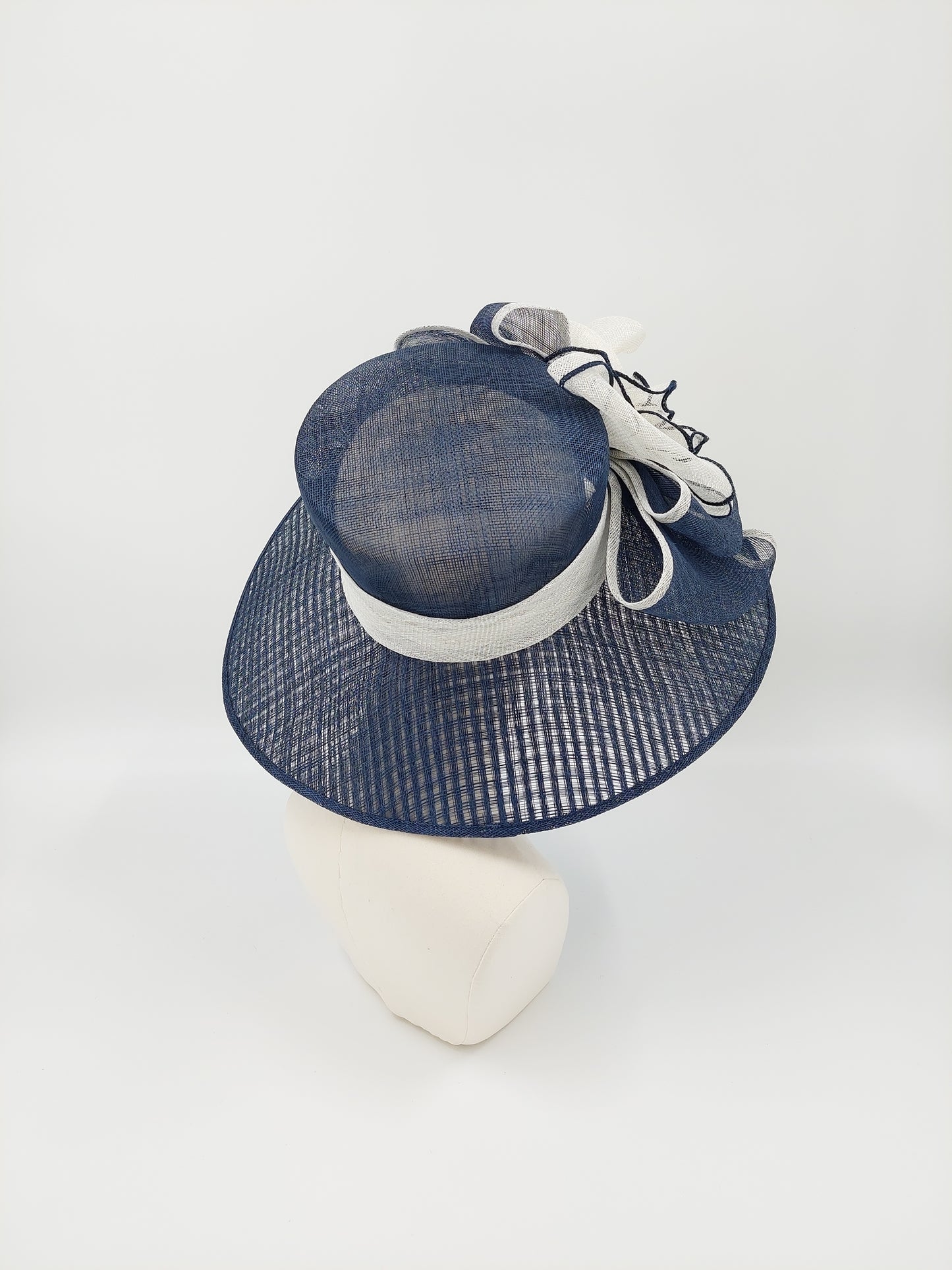 Hat Haven Millinery - handmade hats in Louisville, Kentucky. Custom hats, Derby hats, fascinators, dress hats, Ascot hats, men's hats, hat bands, hat maker, milliner, hatter, church hat, race day hats, hat store in Louisville.