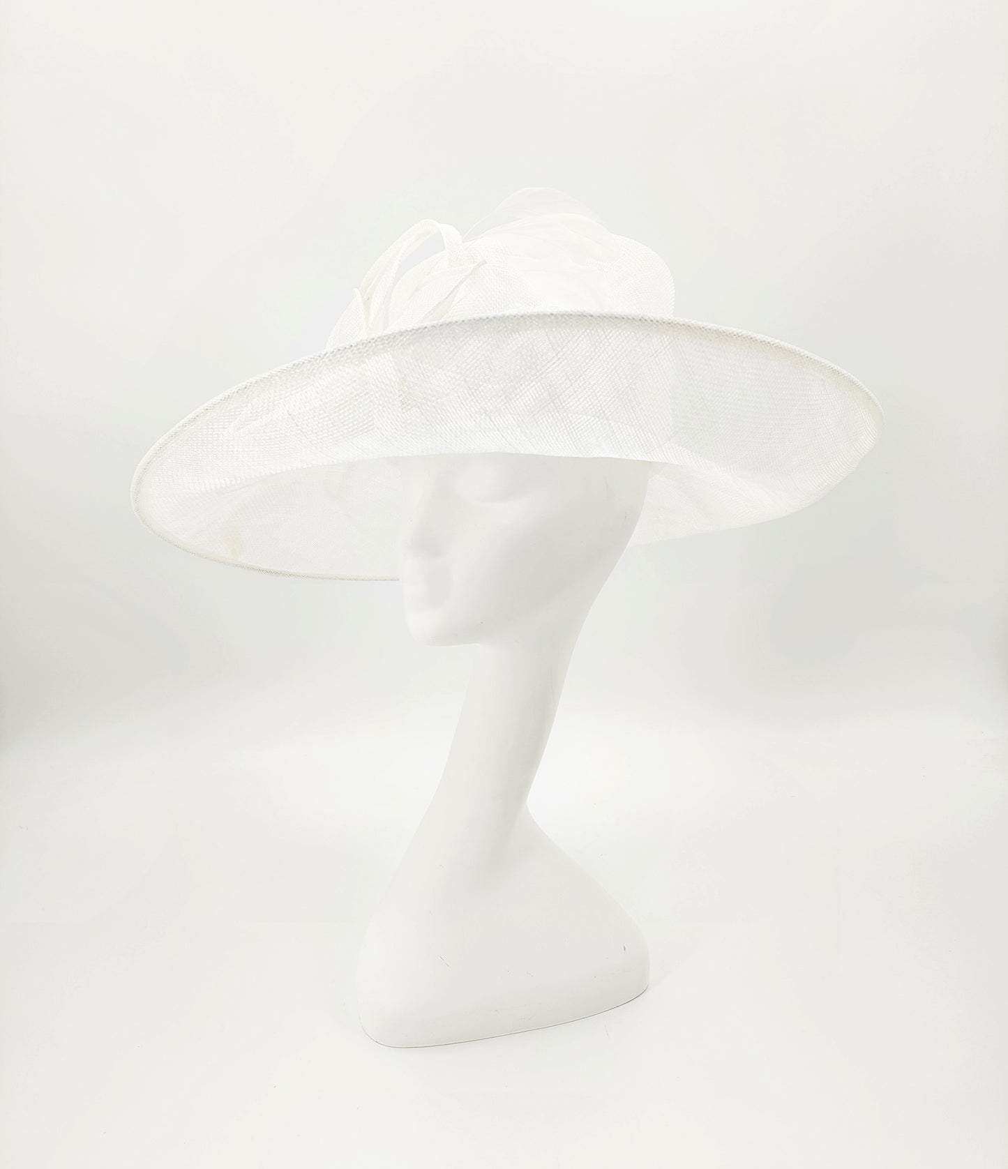 Hat Haven Millinery - An Official Milliner of the Kentucky Derby Museum. Hand made Kentucky Derby Hats & Fascinators. Visit of  pop up shop at the Hyatt Regency during Derby week.