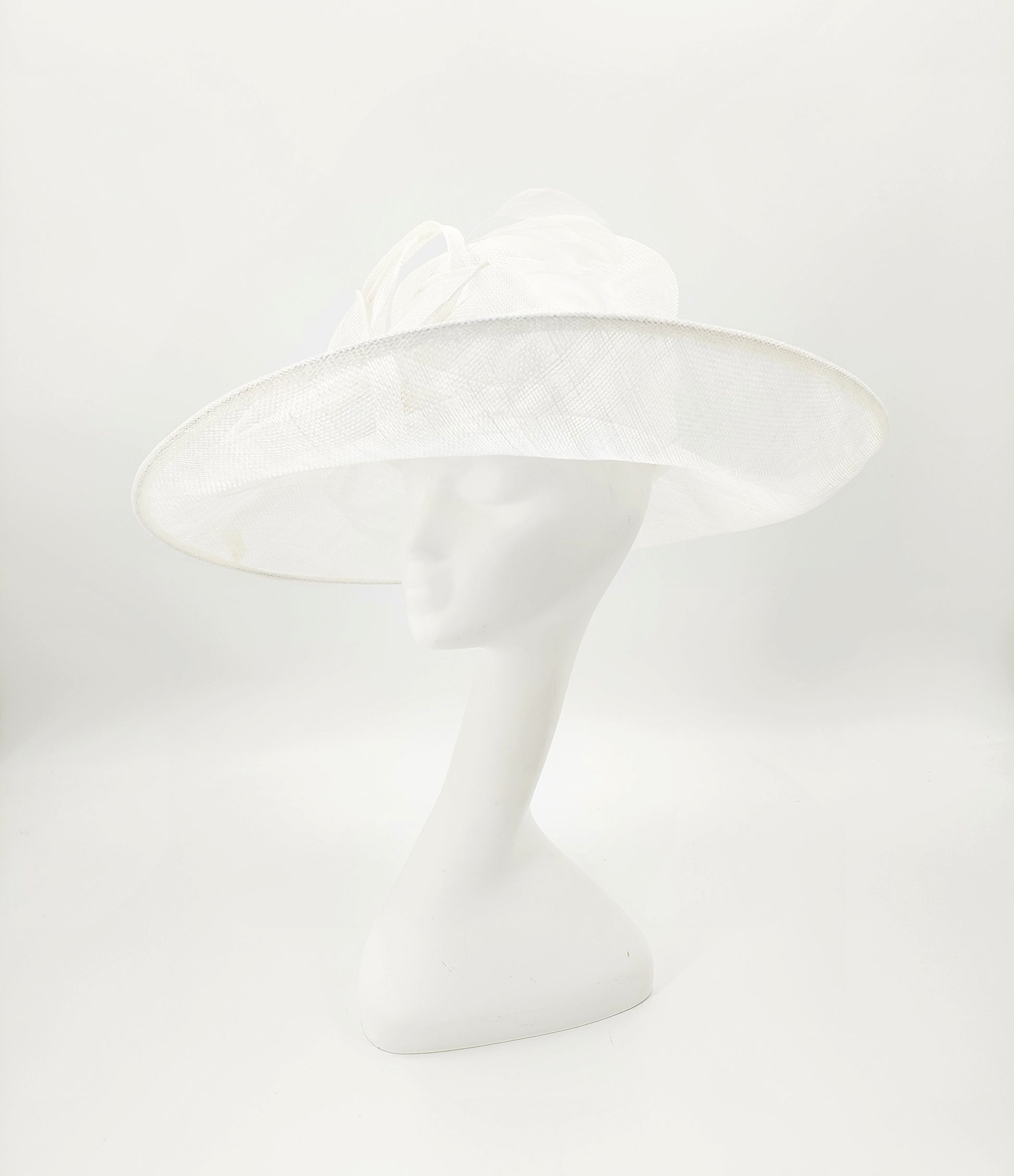 Hat Haven Millinery - An Official Milliner of the Kentucky Derby Museum. Hand made Kentucky Derby Hats & Fascinators. Visit of  pop up shop at the Hyatt Regency during Derby week.