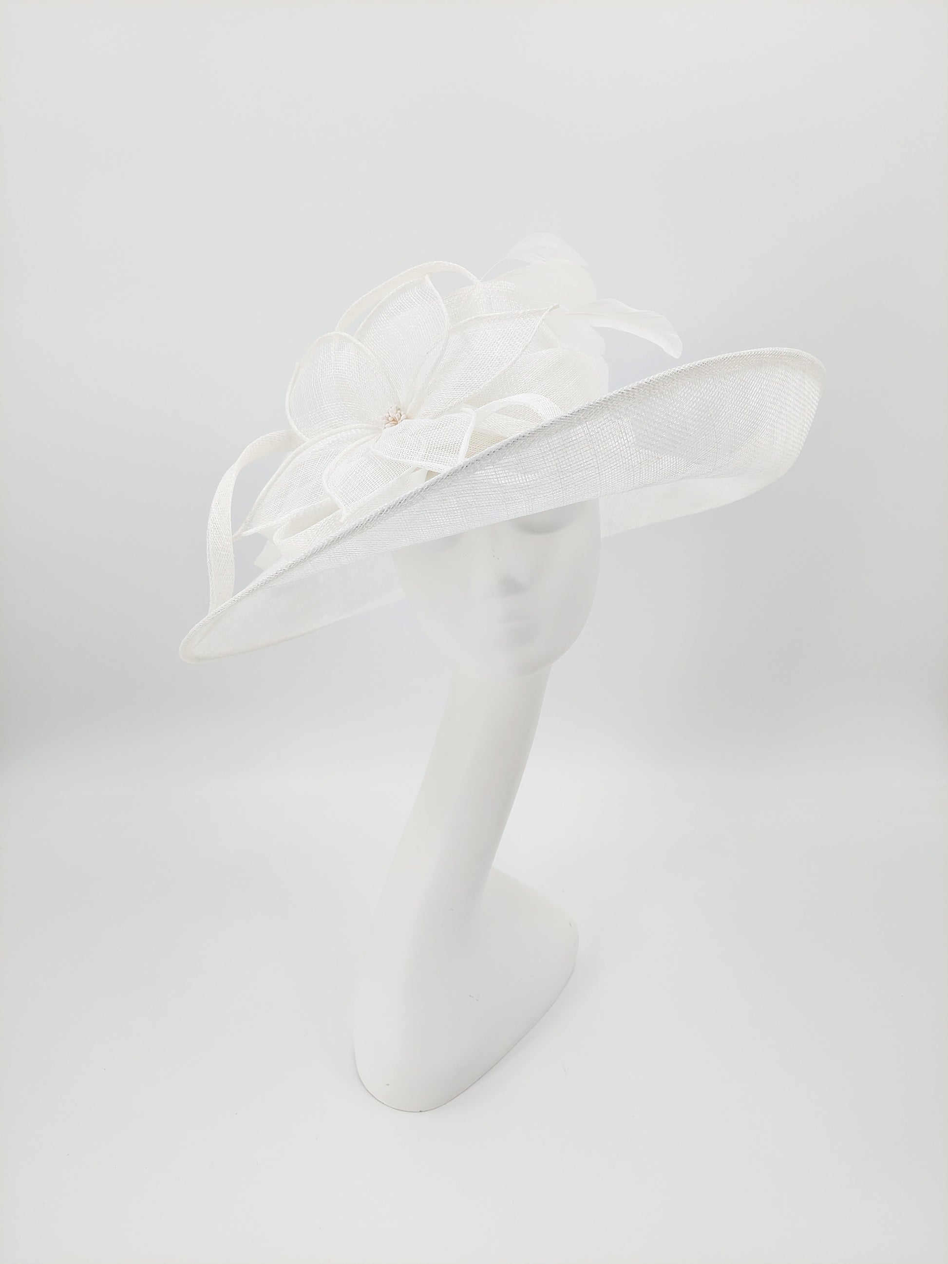 Hat Haven Millinery - An Official Milliner of the Kentucky Derby Museum. Hand made Kentucky Derby Hats & Fascinators. Visit of  pop up shop at the Hyatt Regency during Derby week.