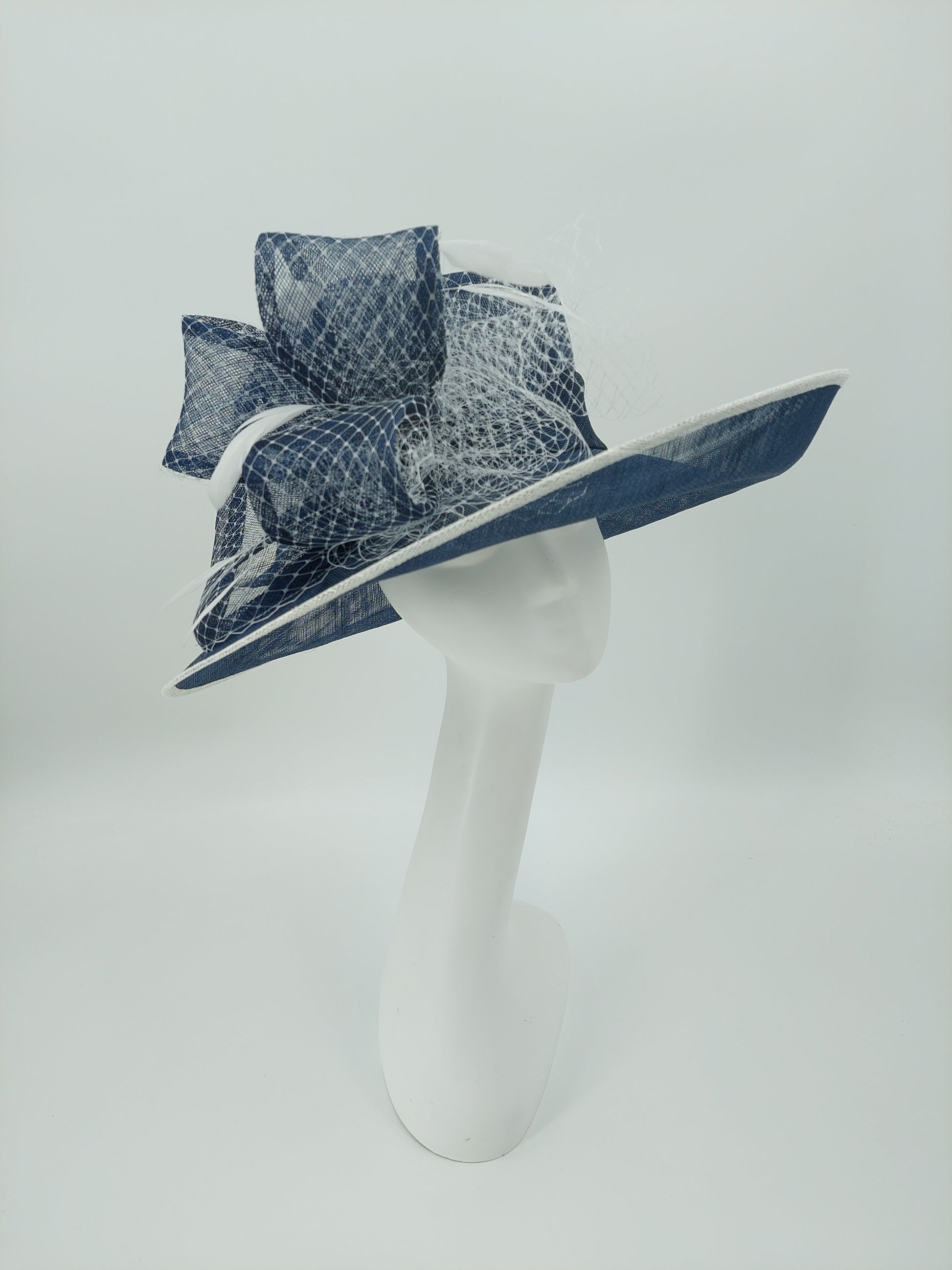 Hat Haven Millinery - An Official Milliner of the Kentucky Derby Museum. Hand made Kentucky Derby Hats & Fascinators. Visit of  pop up shop at the Hyatt Regency during Derby week.