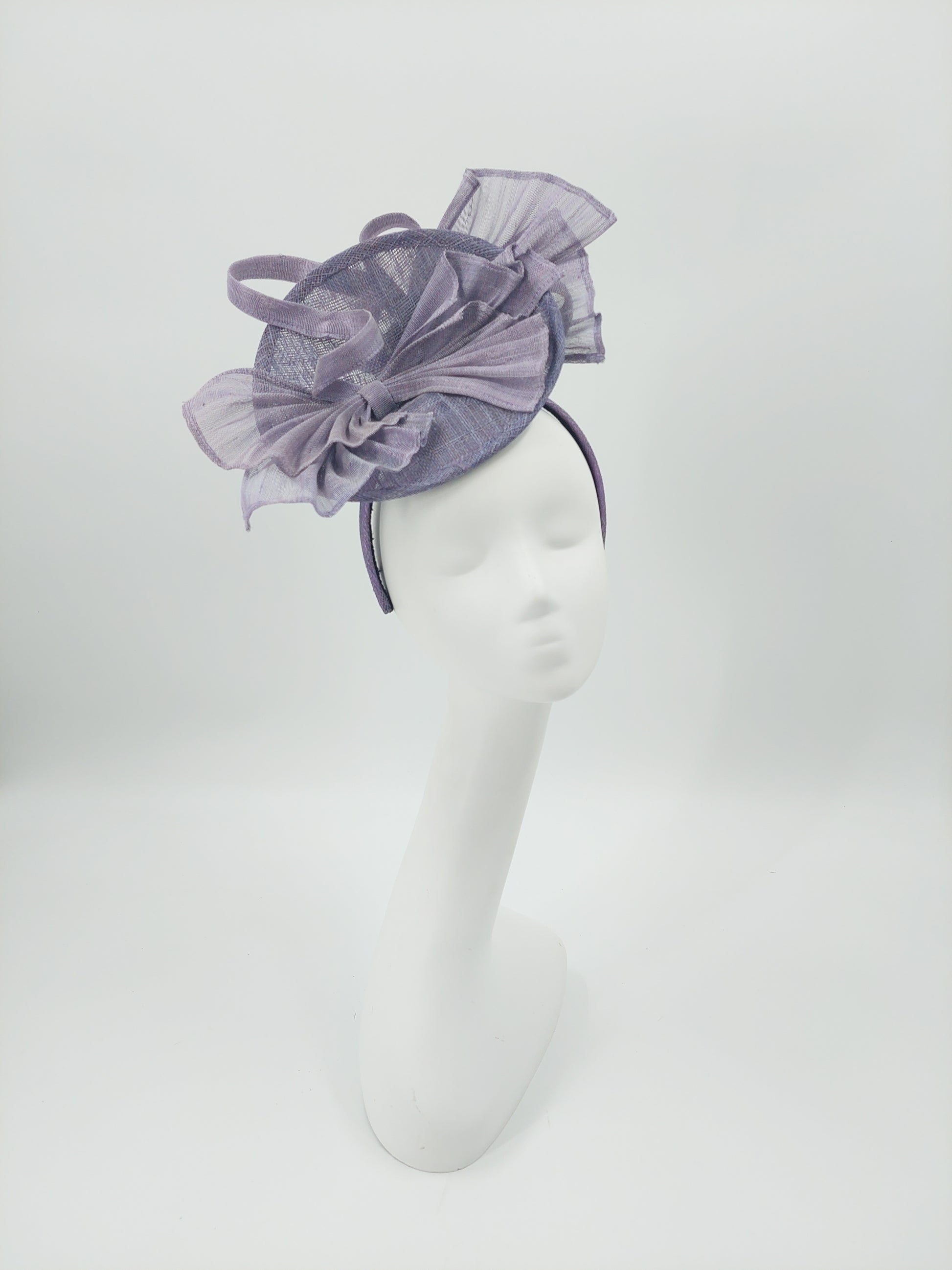 Hat Haven Millinery - Official Milliner of the Kentucky Derby Museum. Featured in the Official Style Guide for the Kentucky Derby. Ladies Derby hats, fascinators, men's hats, bridal headwear.