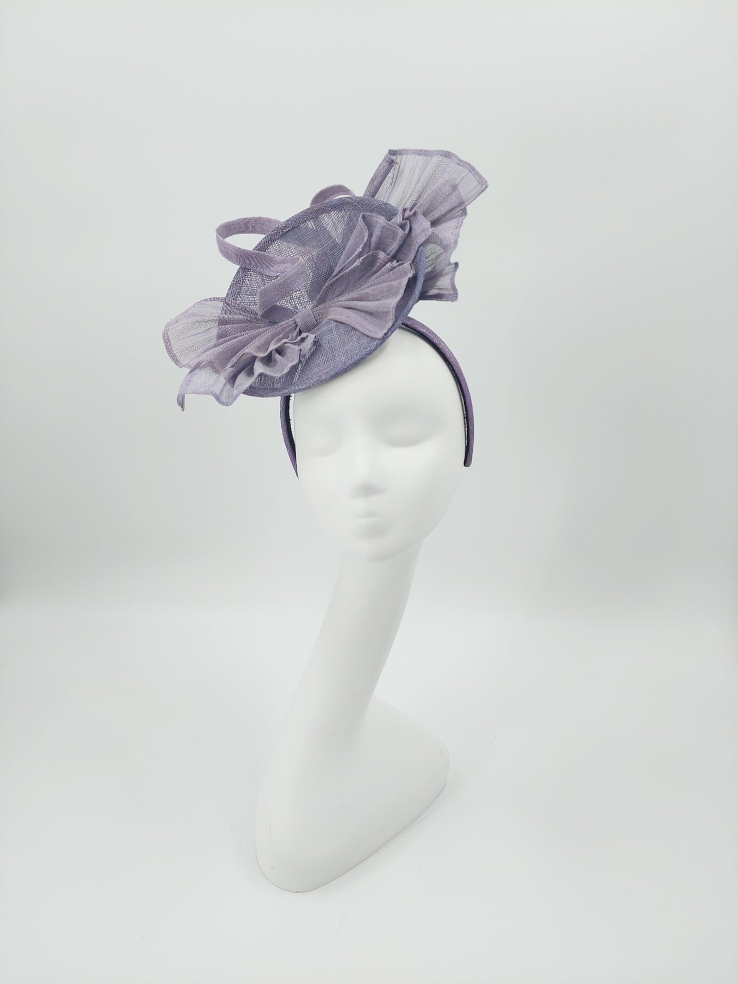 Hat Haven Millinery - Official Milliner of the Kentucky Derby Museum. Featured in the Official Style Guide for the Kentucky Derby. Ladies Derby hats, fascinators, men's hats, bridal headwear.