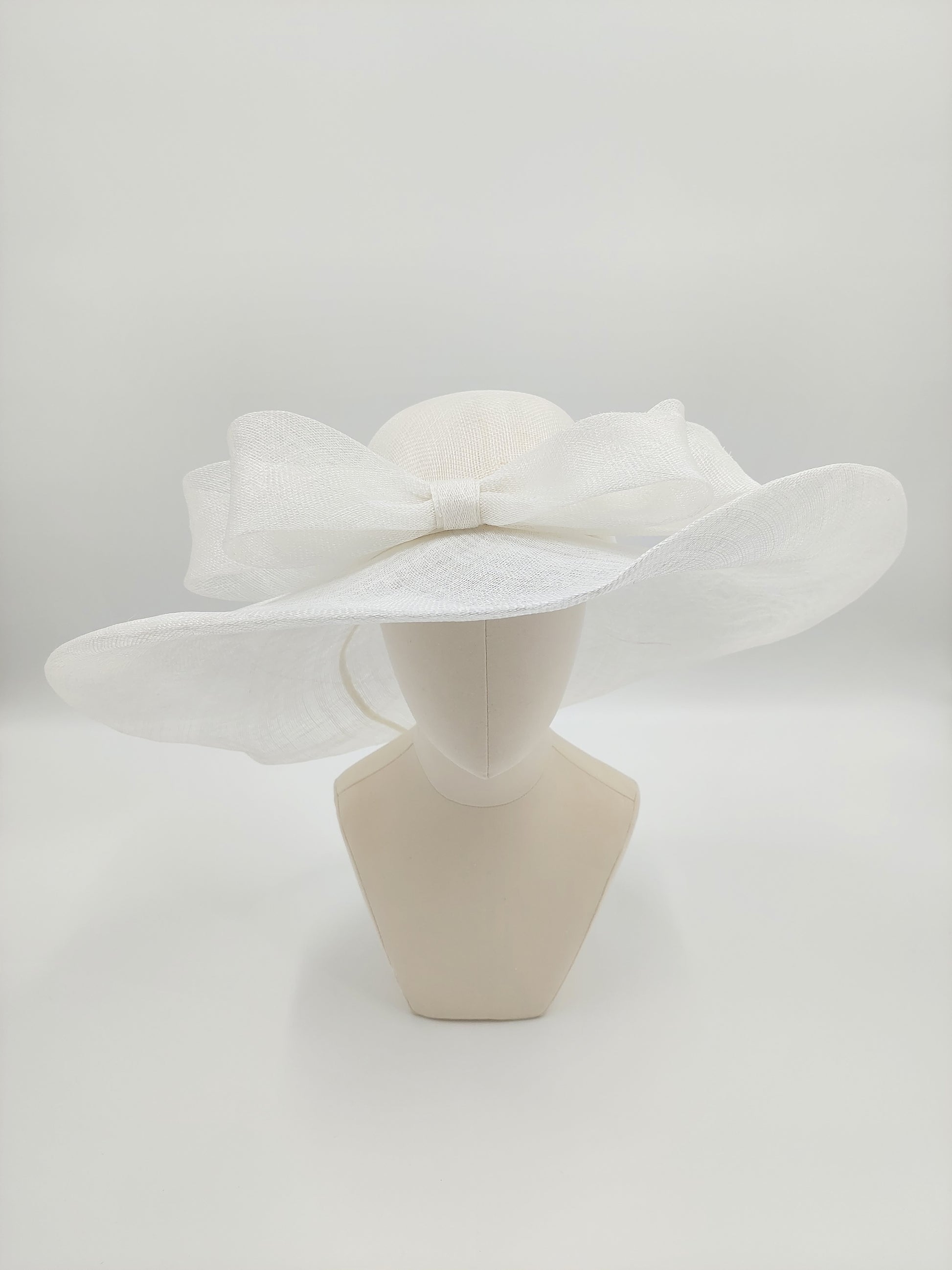 Hat Haven Millinery hat store in Louisville Kentucky, custom hat maker, miller, ladies dress hats, wedding hats, Kentucky Derby hats, fascinators, hatinators, men's hats, hat bands, Ascot hats, fashion on the field, race day hats.