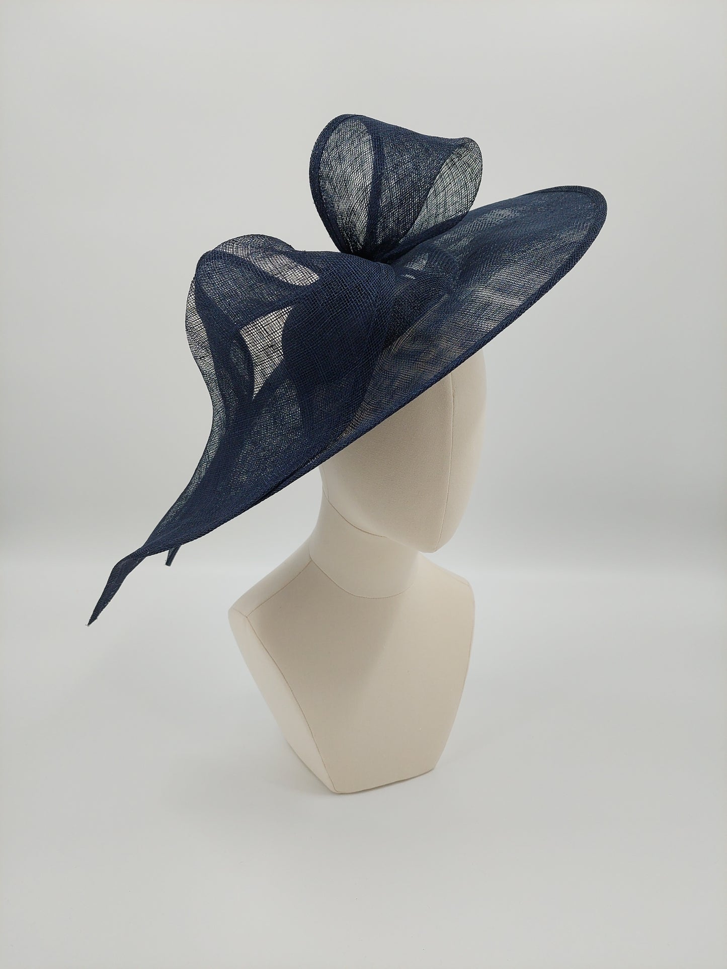 Hat Haven Millinery hat store in Louisville Kentucky, custom hat maker, miller, ladies dress hats, wedding hats, Kentucky Derby hats, fascinators, hatinators, men's hats, hat bands, Ascot hats, fashion on the field, race day hats.