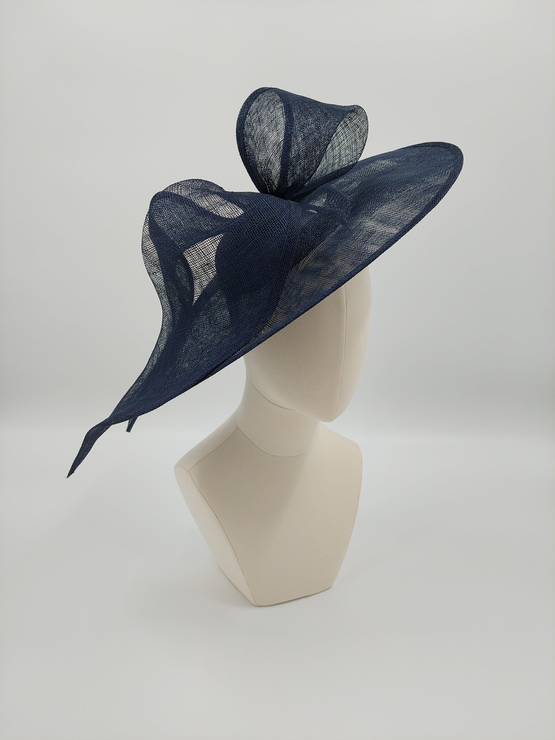 Hat Haven Millinery hat store in Louisville Kentucky, custom hat maker, miller, ladies dress hats, wedding hats, Kentucky Derby hats, fascinators, hatinators, men's hats, hat bands, Ascot hats, fashion on the field, race day hats.
