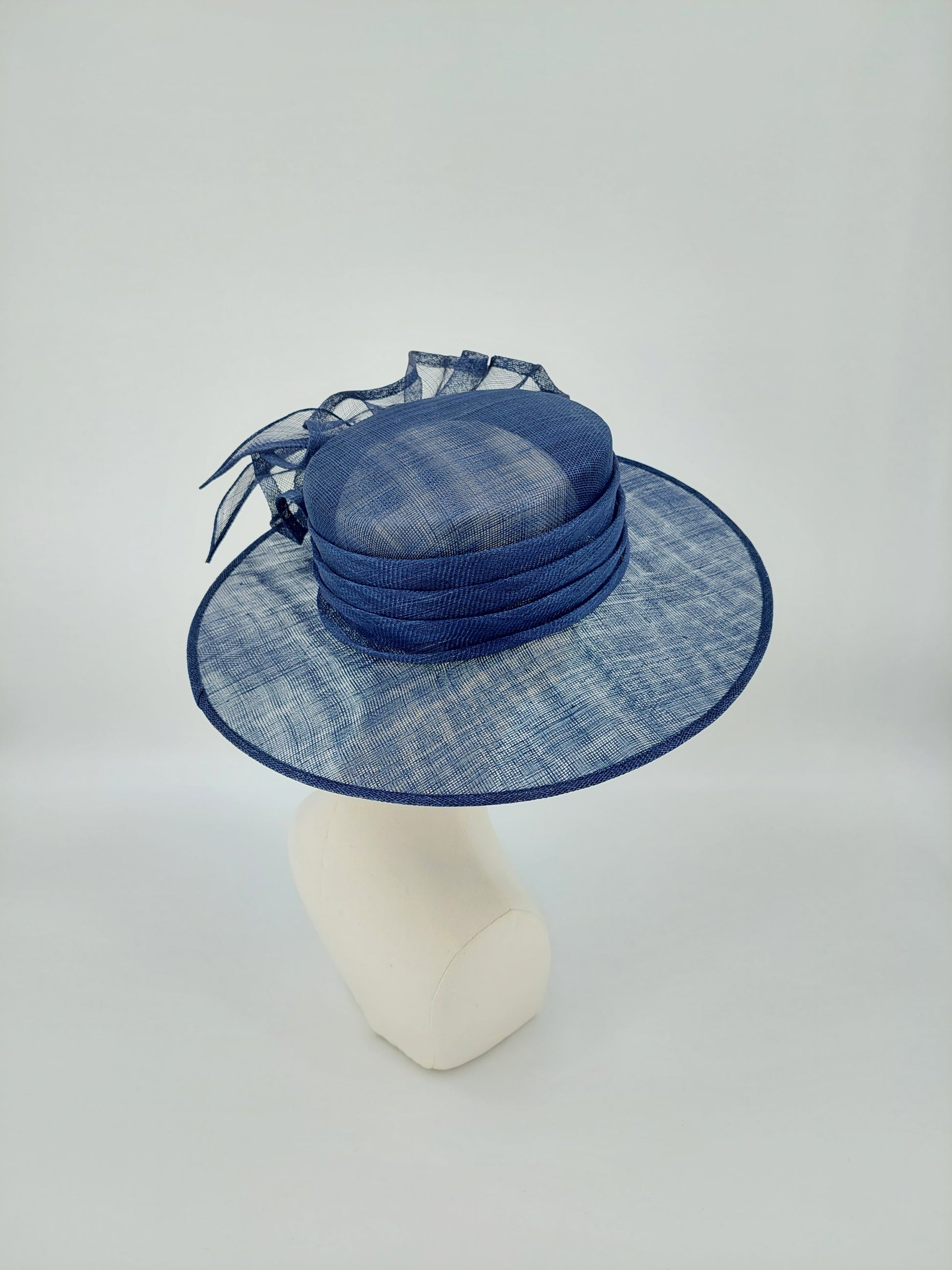 Hat Haven Millinery hat store in Louisville Kentucky, custom hat maker, miller, ladies dress hats, wedding hats, Kentucky Derby hats, fascinators, hatinators, men's hats, hat bands, Ascot hats, fashion on the field, race day hats.