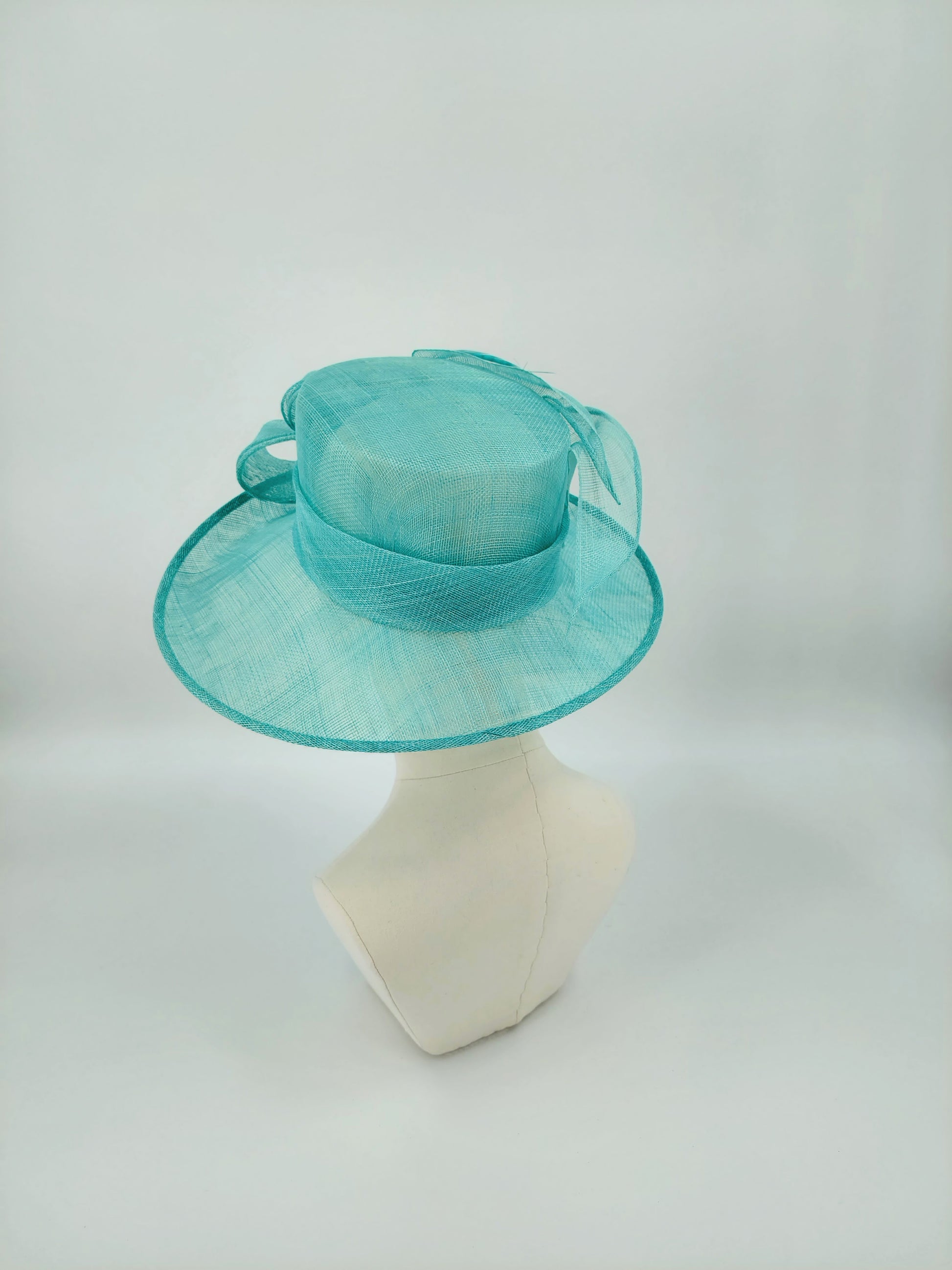 Hat Haven Millinery hat store in Louisville Kentucky, custom hat maker, miller, ladies dress hats, wedding hats, Kentucky Derby hats, fascinators, hatinators, men's hats, hat bands, Ascot hats, fashion on the field, race day hats.