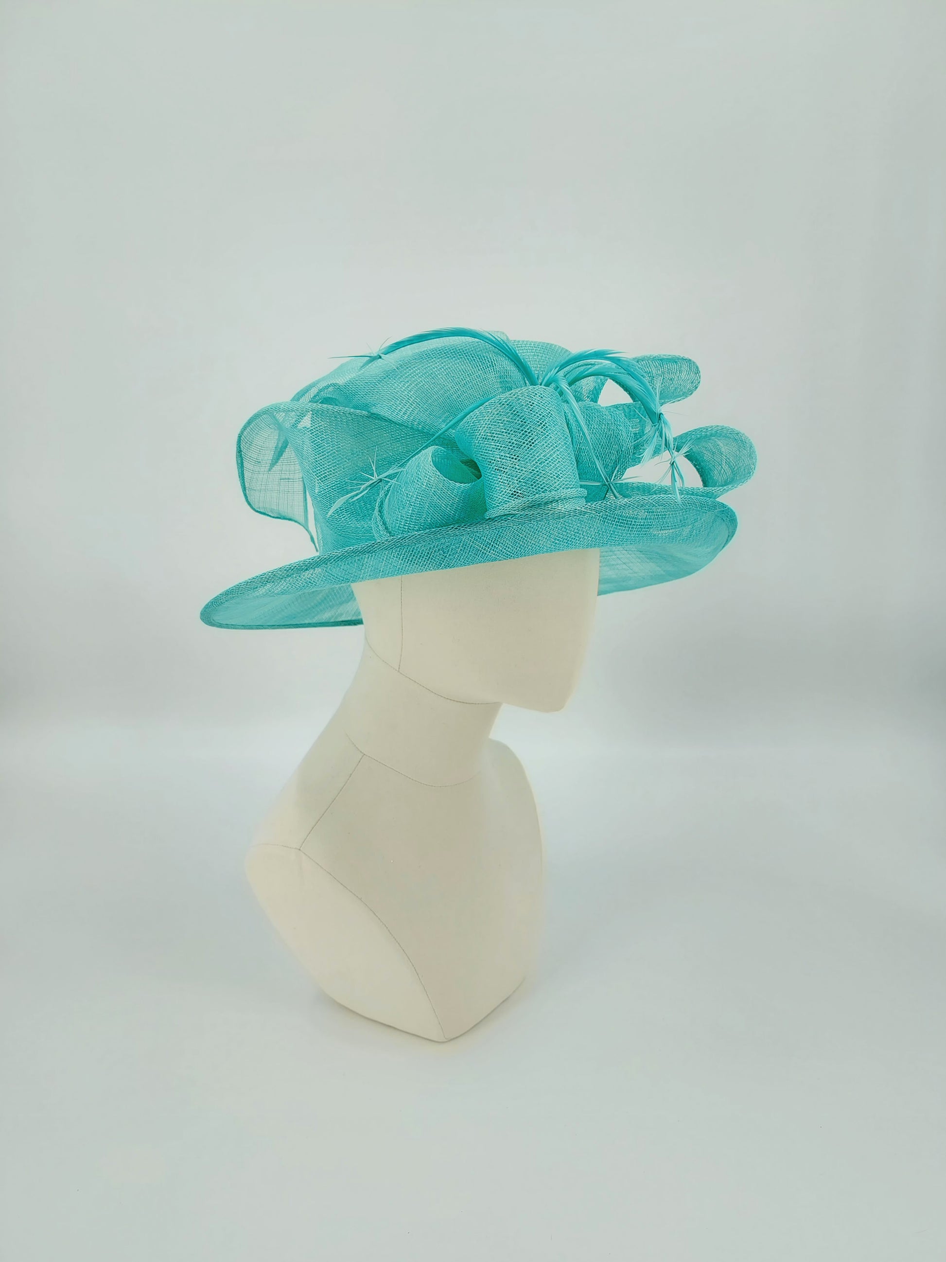 Hat Haven Millinery hat store in Louisville Kentucky, custom hat maker, miller, ladies dress hats, wedding hats, Kentucky Derby hats, fascinators, hatinators, men's hats, hat bands, Ascot hats, fashion on the field, race day hats.