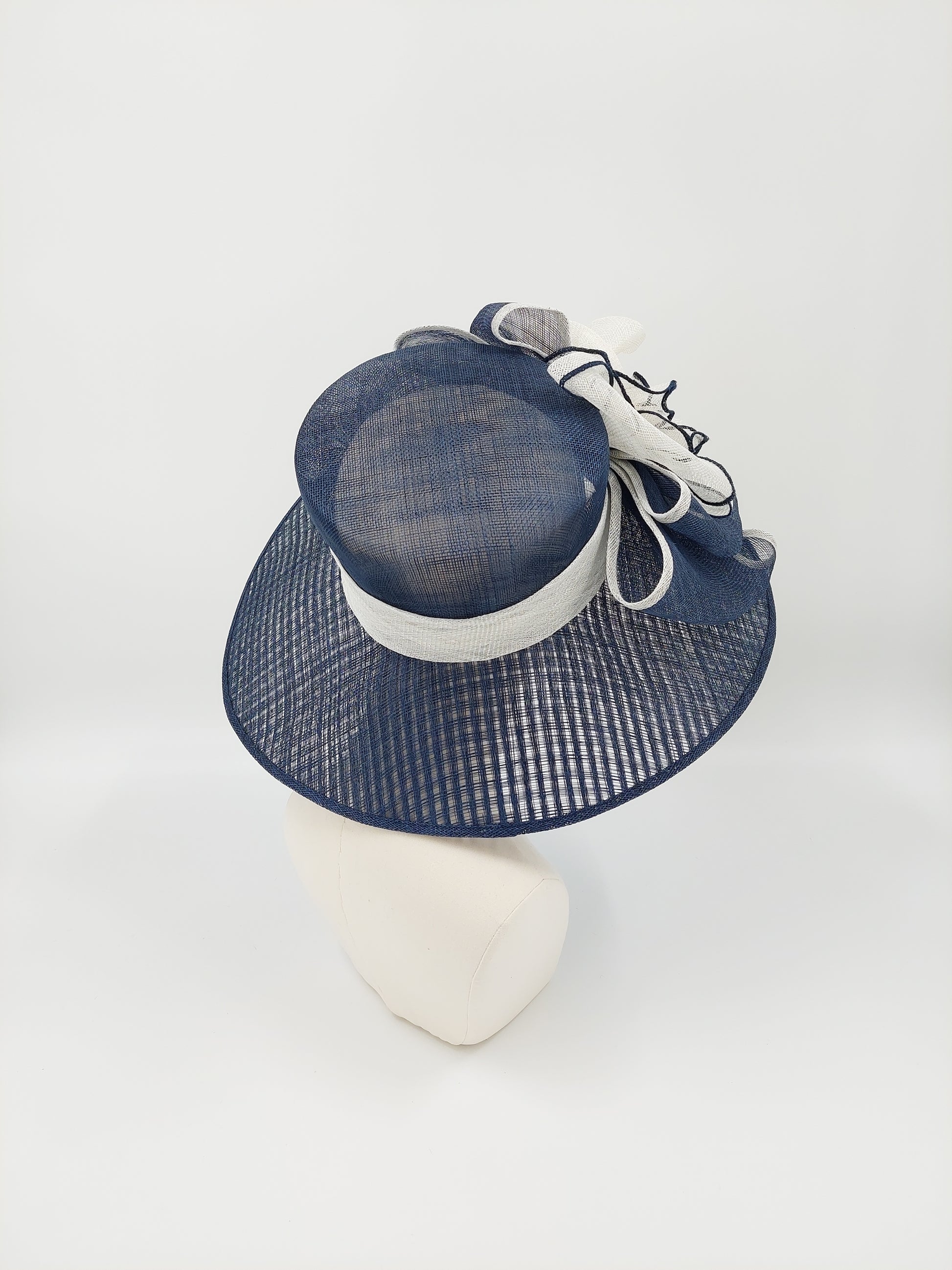 Hat Haven Millinery - handmade hats in Louisville, Kentucky. Custom hats, Derby hats, fascinators, dress hats, Ascot hats, men's hats, hat bands, hat maker, milliner, hatter, church hat, race day hats, hat store in Louisville.
