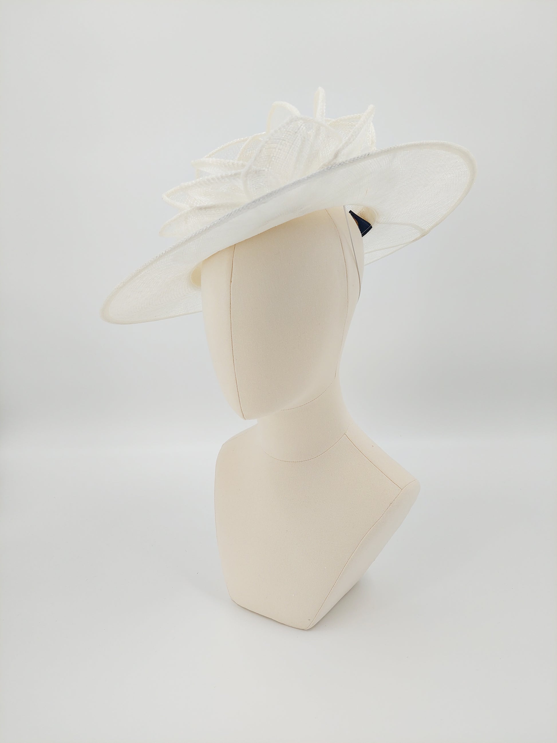 Hat Haven Millinery - handmade hats in Louisville, Kentucky. Custom hats, Derby hats, fascinators, dress hats, Ascot hats, men's hats, hat bands, hat maker, milliner, hatter, church hat, race day hats, hat store in Louisville.