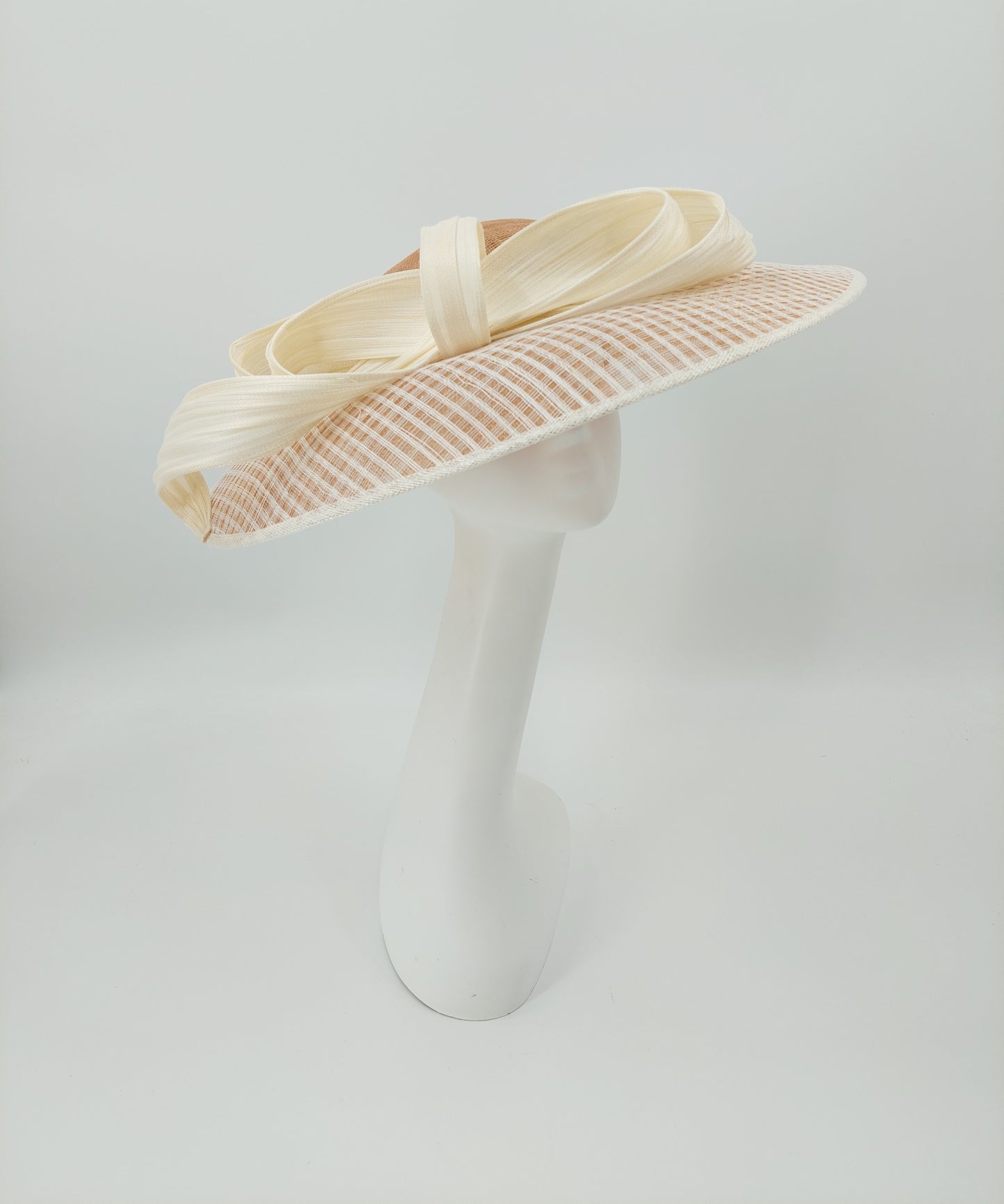 Hat Haven Millinery - An Official Milliner of the Kentucky Derby Museum. Hand made Kentucky Derby Hats & Fascinators. Visit of  pop up shop at the Hyatt Regency during Derby week.