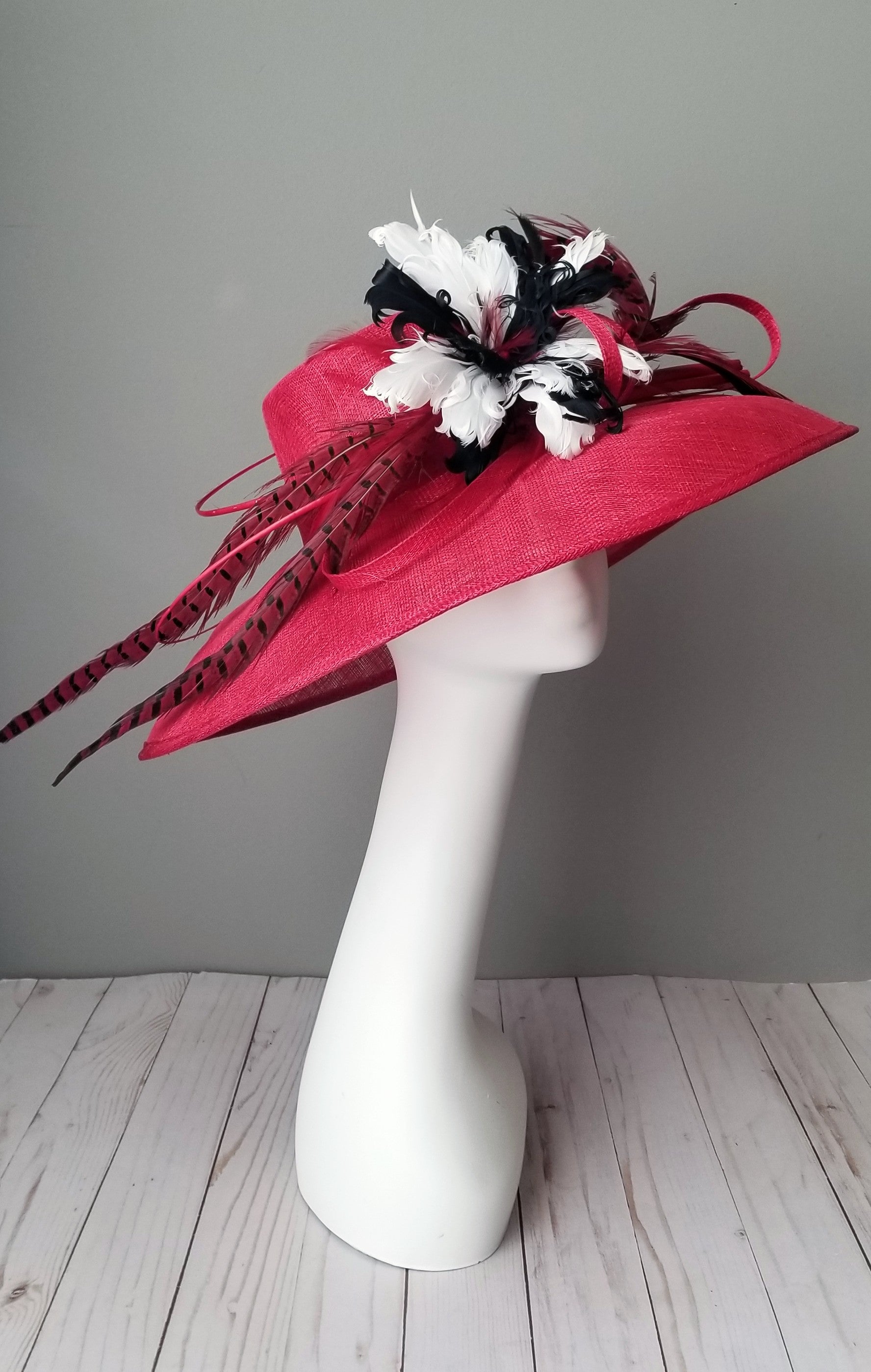 Hat Haven millinery hat shop in Louisville, Kentucky. Custom hats, Kentucky Derby hats, ladies dress hats, fascinators, hatinators, wedding hats, mother of the bride hats, bridal head pieces, men's hats, boutonnieres, custom millinery hat maker, Ascot hats, Melbourne Cup hats, race day hats.