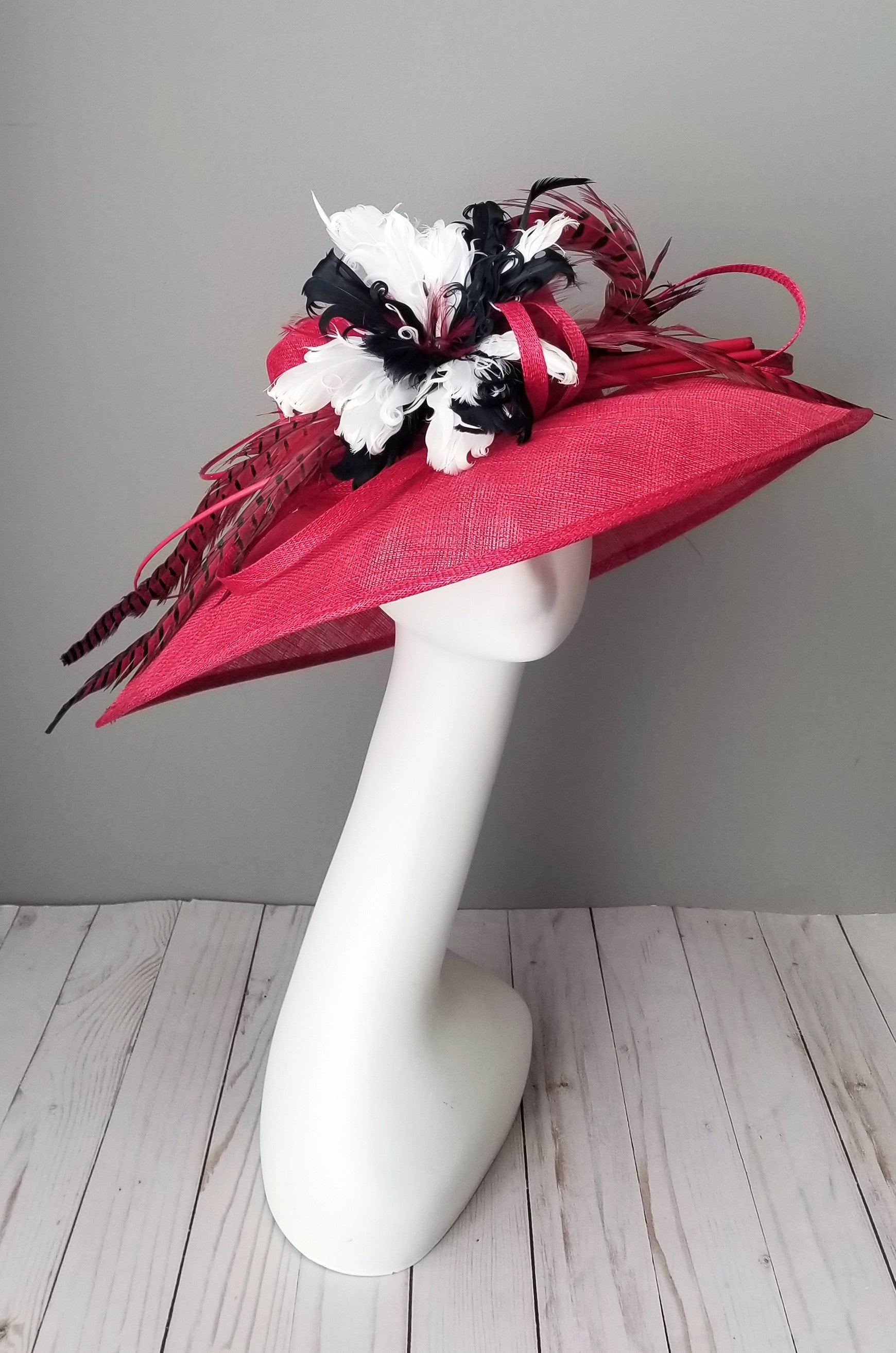 Hat Haven millinery hat shop in Louisville, Kentucky. Custom hats, Kentucky Derby hats, ladies dress hats, fascinators, hatinators, wedding hats, mother of the bride hats, bridal head pieces, men's hats, boutonnieres, custom millinery hat maker, Ascot hats, Melbourne Cup hats, race day hats.