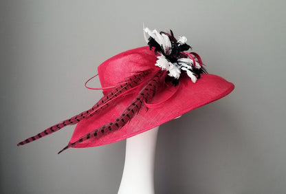 Hat Haven millinery hat shop in Louisville, Kentucky. Custom hats, Kentucky Derby hats, ladies dress hats, fascinators, hatinators, wedding hats, mother of the bride hats, bridal head pieces, men's hats, boutonnieres, custom millinery hat maker, Ascot hats, Melbourne Cup hats, race day hats.