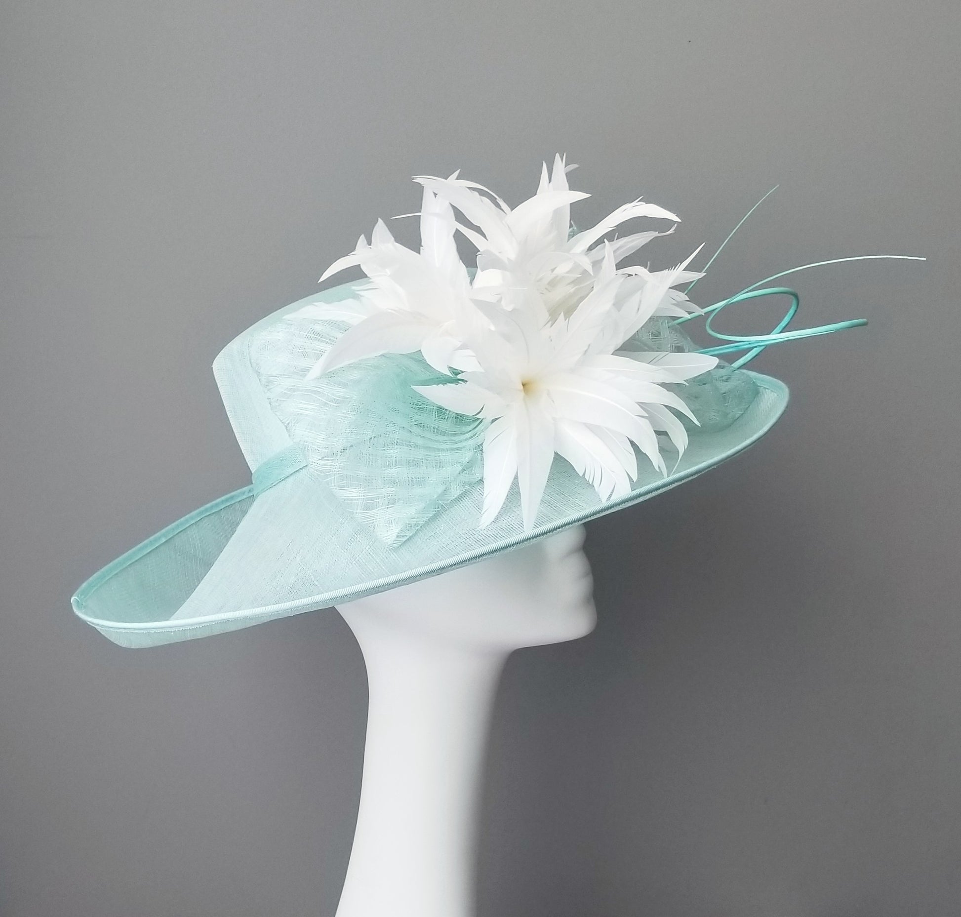 Hat Haven millinery hat shop in Louisville, Kentucky. Custom hats, Kentucky Derby hats, ladies dress hats, fascinators, hatinators, wedding hats, mother of the bride hats, bridal head pieces, men's hats, boutonnieres, custom millinery hat maker, Ascot hats, Melbourne Cup hats, race day hats.
