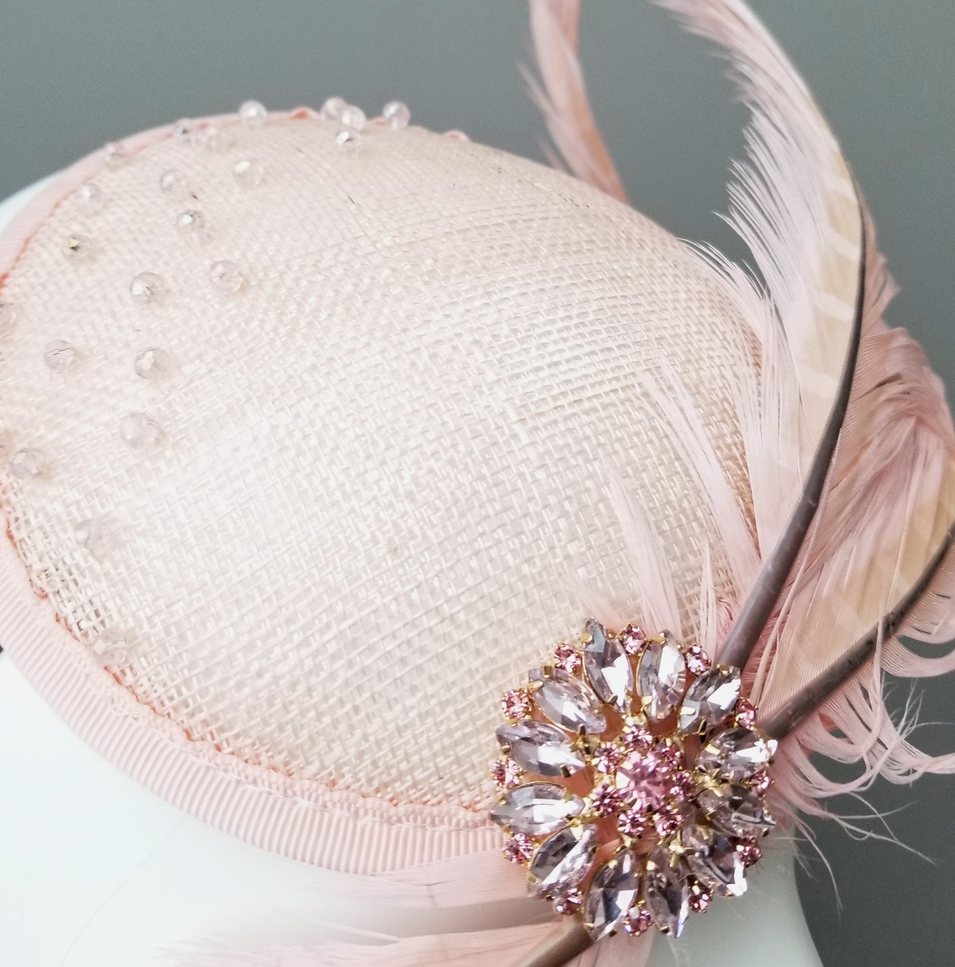 Hat Haven millinery hat shop in Louisville, Kentucky. Ladies dress hats, Kentucky Derby hats, fascinators, men's hats, bridal head pieces, custom hats, hat maker, Ascot hats, wedding hats,. Blush pink fascinators. Beaded fascinator.